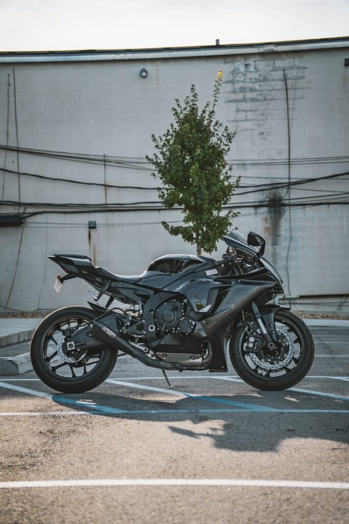 Marketing photos of a black pre-owned 2020 Yamaha YZF-R1