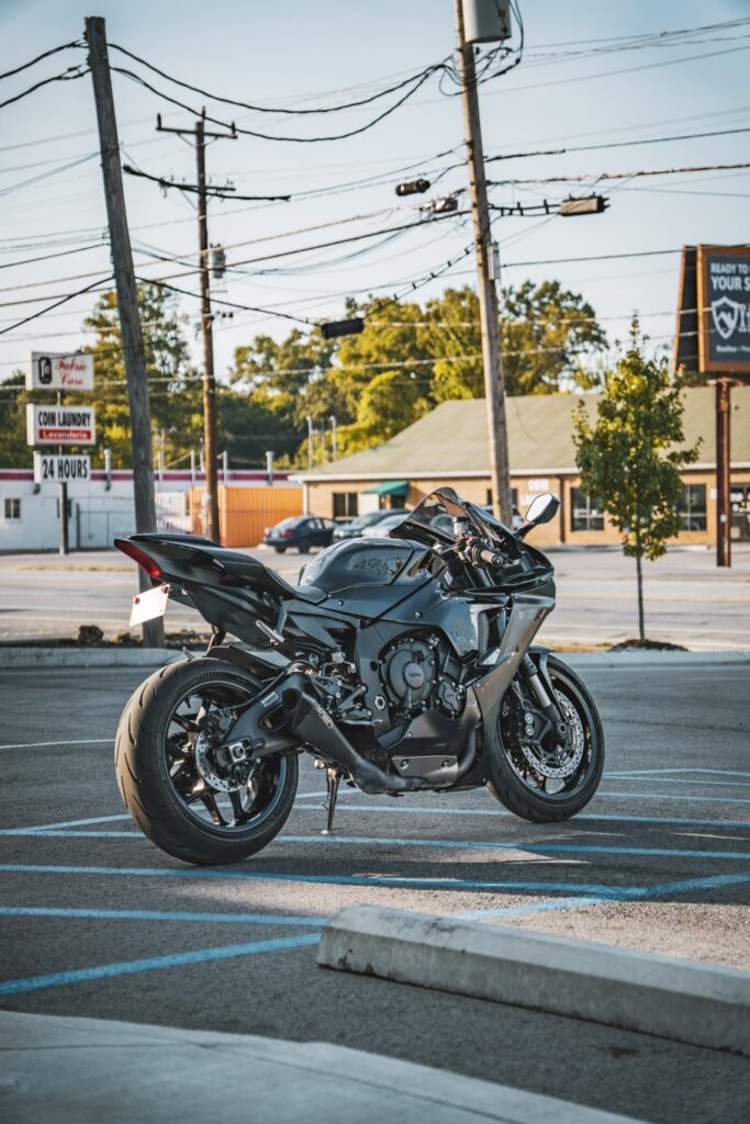 Marketing photos of a black pre-owned 2020 Yamaha YZF-R1