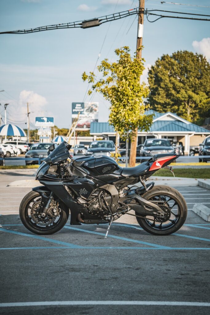 Marketing photos of a black pre-owned 2020 Yamaha YZF-R1